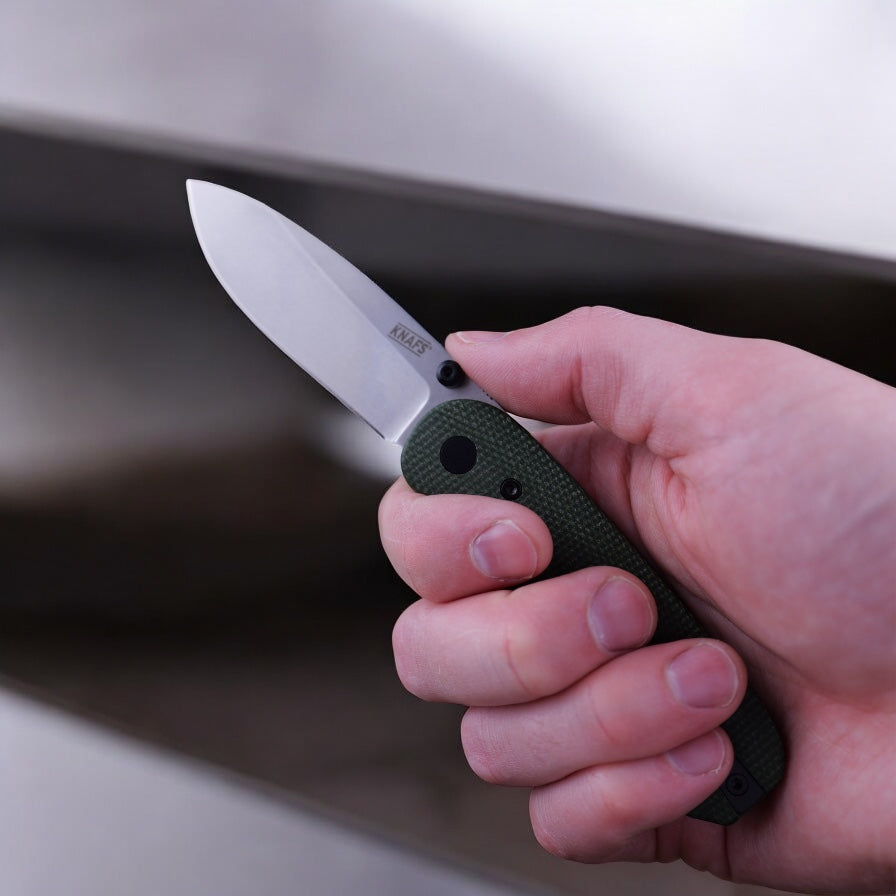 knafs lander 1 green micarta in hand